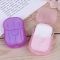 Pack of colorful travel paper soap sheets in a compact travel box