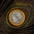 Intricate Lakshmi Ganesh embossed design on decorative religious coin