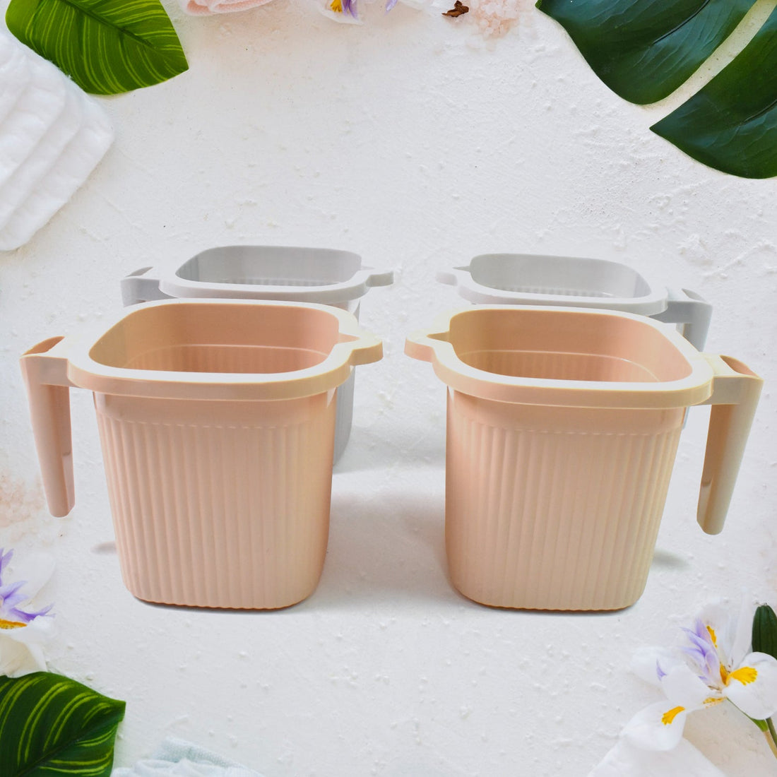 Plastic Bath Mug Set of 4 in mixed colors, showcasing their square design.