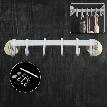 Wall-mounted bath towel hanger securely holding clean towels in a modern bathroom.