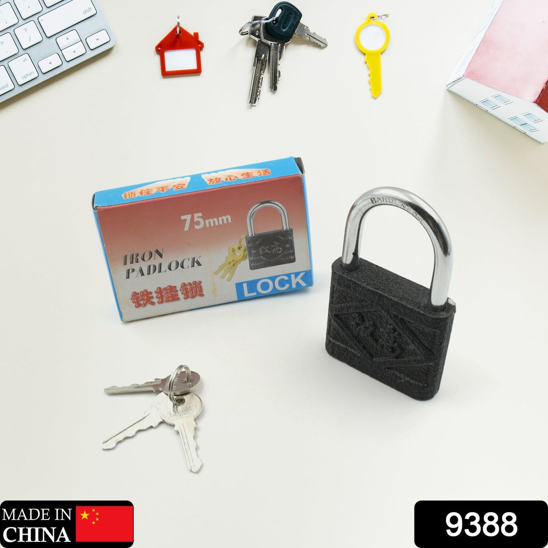 75mm black iron padlock with brass core, ideal for securing gates and sheds.