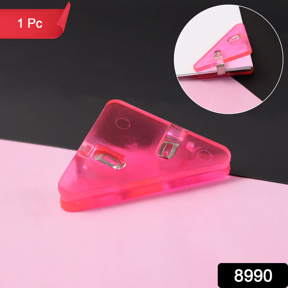 Close-up of durable triangle paper clip securing paper corner