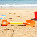 Top view of lightweight plastic kids sand shovel for beach and sandbox