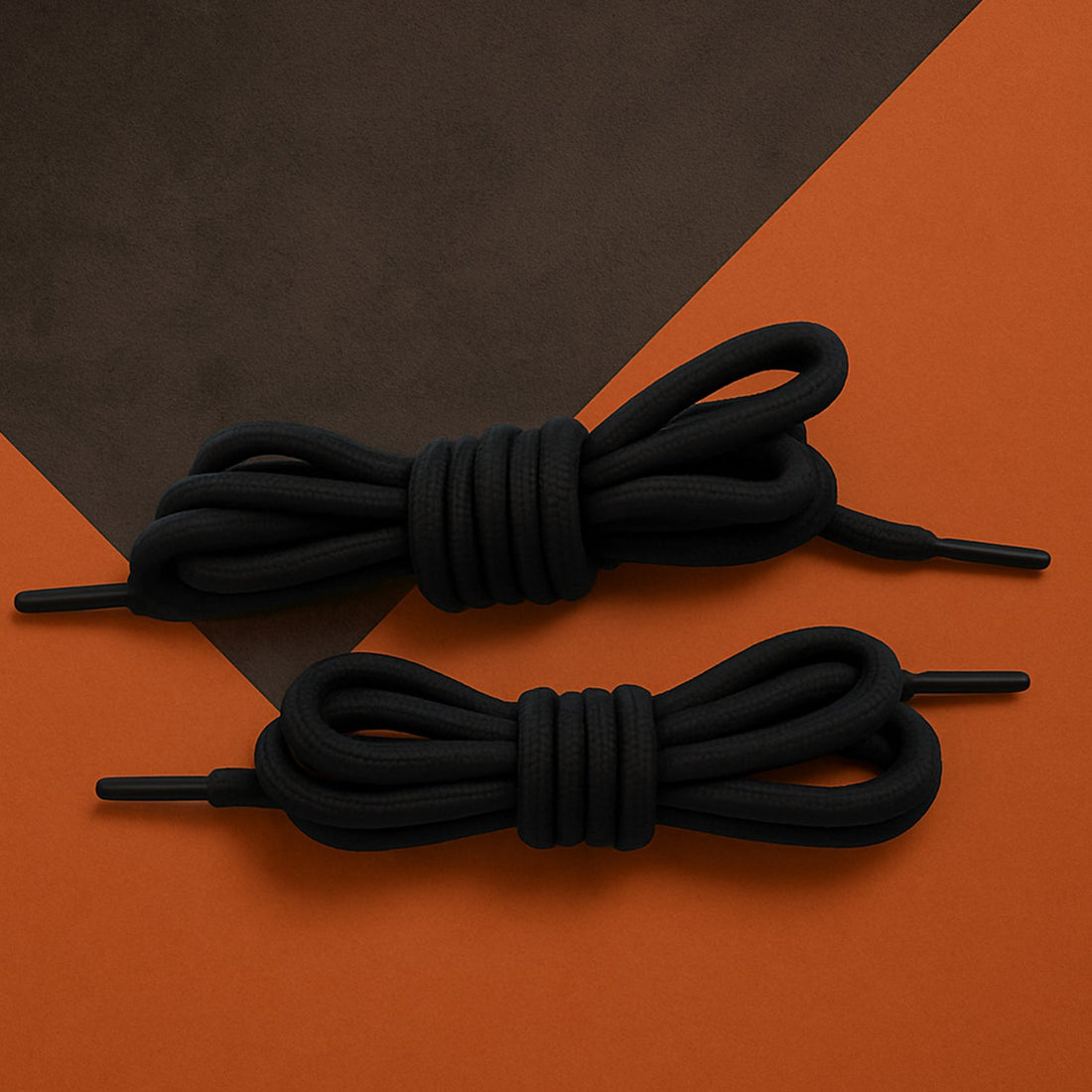 A pair of vibrant mixed color polyester shoe laces displayed on a white background.