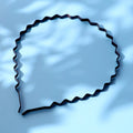 Close-up of metal wavy hairband with anti-slip flexible design