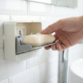 Soap holder tray showing drainage slots for water flow