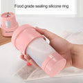 Stylish portable juicer blending a healthy drink for on-the-go enjoyment.