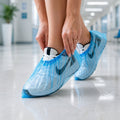 Waterproof disposable shoe covers protecting footwear