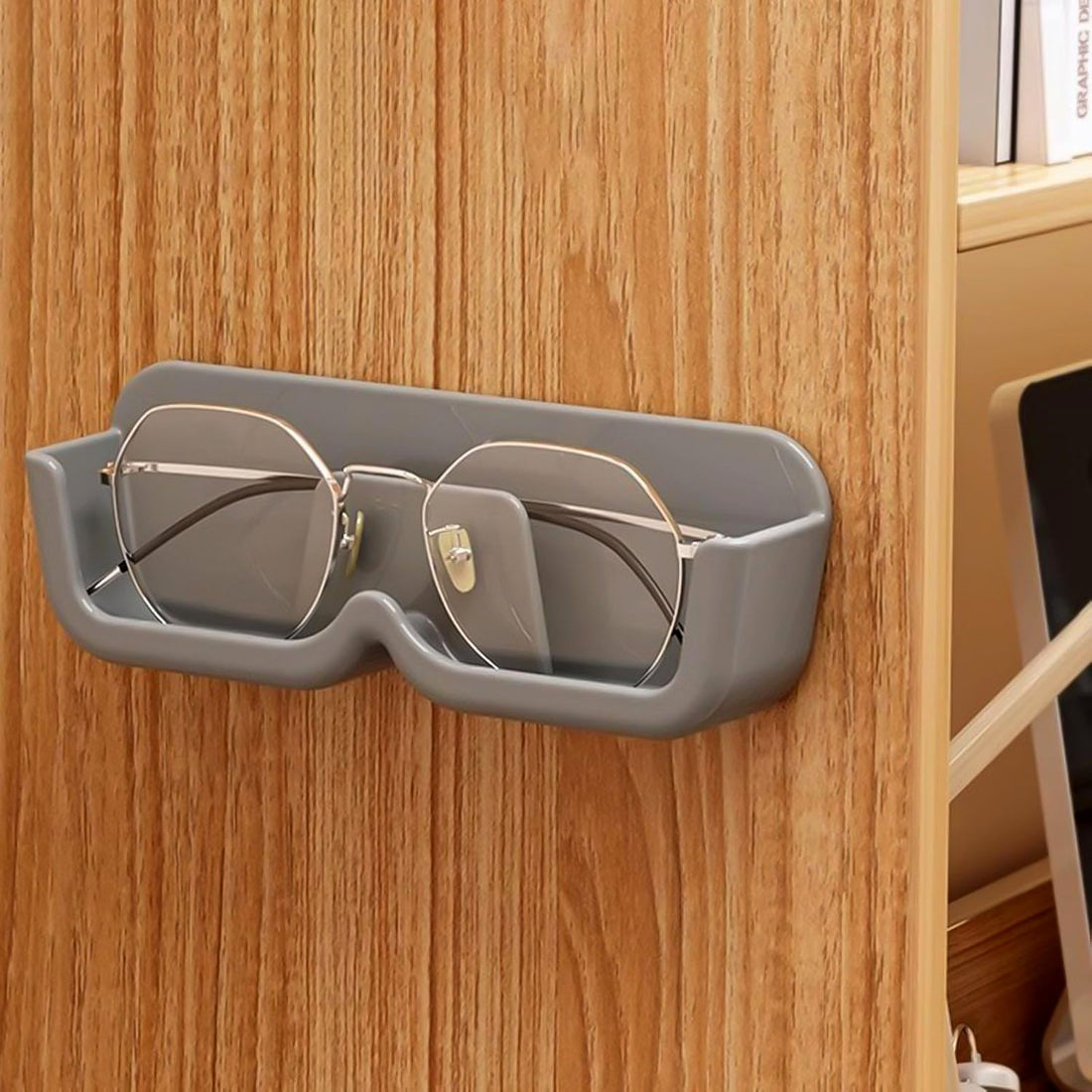 Wall mounted sunglasses holder displaying multiple pairs of eyewear securely