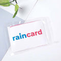 Emergency waterproof raincoat card unfolded to full size showing protection