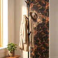 Metal coat rack stand featuring hooks for hats and scarves organization
