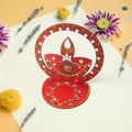Handcrafted wooden diya stand with stone detailing for Indian festivals