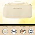 Travel organizer makeup bag with sturdy stitched handle for carrying