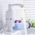 Close-up view of electric water heater faucet head with temperature control