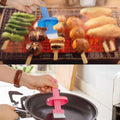 Ergonomic plastic spatula with holder, designed for comfortable kitchen use.