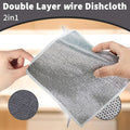 Close-up of bottle cleaning brush and scrub pad for kitchen use