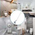 Golf-shaped toilet cleaning brush with its adhesive wall holder.