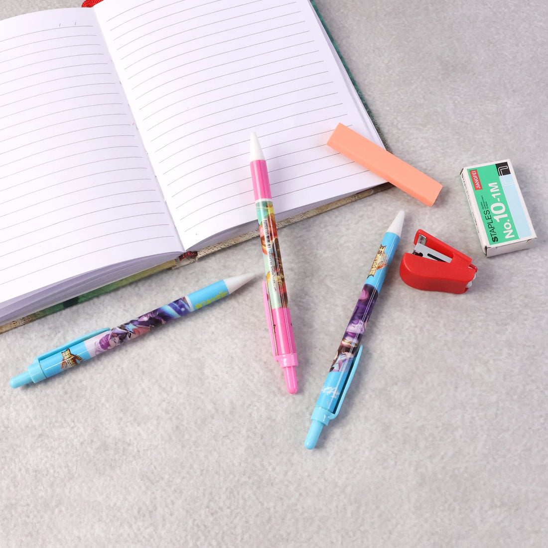 Complete 6-in-1 stationery set including pens, stapler, staples, and eraser
