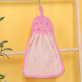 Microfiber kitchen towel hanging beside wash basin for easy access