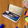 Metal tin box with educational world map print holding geometry tools