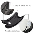 Beard apron efficiently capturing all hair clippings during a precise beard trim.