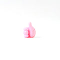 Side profile of pink silicone hand clip wall holder for organizing cables