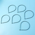 Single metal zigzag hair band showing black wavy style for men and women