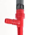 Lawn sprinkler providing wide water coverage on a vibrant green garden lawn.