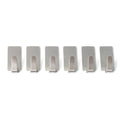 Wall hooks hanging keys and towels in home setting