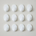 Close up of a strong self adhesive hook showing compact design
