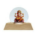 Spiritual 3D Lord Ganesha LED night lamp glowing warmly in a dark room