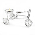 Decorative cycle tealight stand with candle enhancing living space ambiance