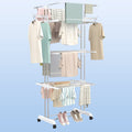 Compact foldable clothes drying rack shown partially folded for storage.