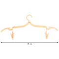 Close-up of dual clips on an adjustable folding clothes hanger
