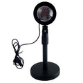 Sunset Projection Lamp demonstrating its 360-degree rotation capability.