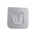 Transparent self-adhesive wall hook ready for easy peel-and-stick application.