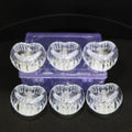 Battery powered LED crystal tealight candles set illuminating room