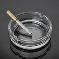 Sleek and sturdy crystal glass ashtray, a blend of form and function.