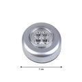 Close-up of the stick-on touch light featuring bright LED bulbs.