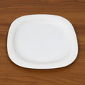 White plastic square dinner plate, easy to clean and stackable