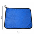 Comparison shot of microfiber cleaning cloth next to other cleaning towels