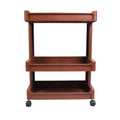 Close-up of the durable plastic shelves on the serving trolley.