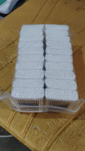 Detailed view of a bamboo cotton swab's pure cotton tip.