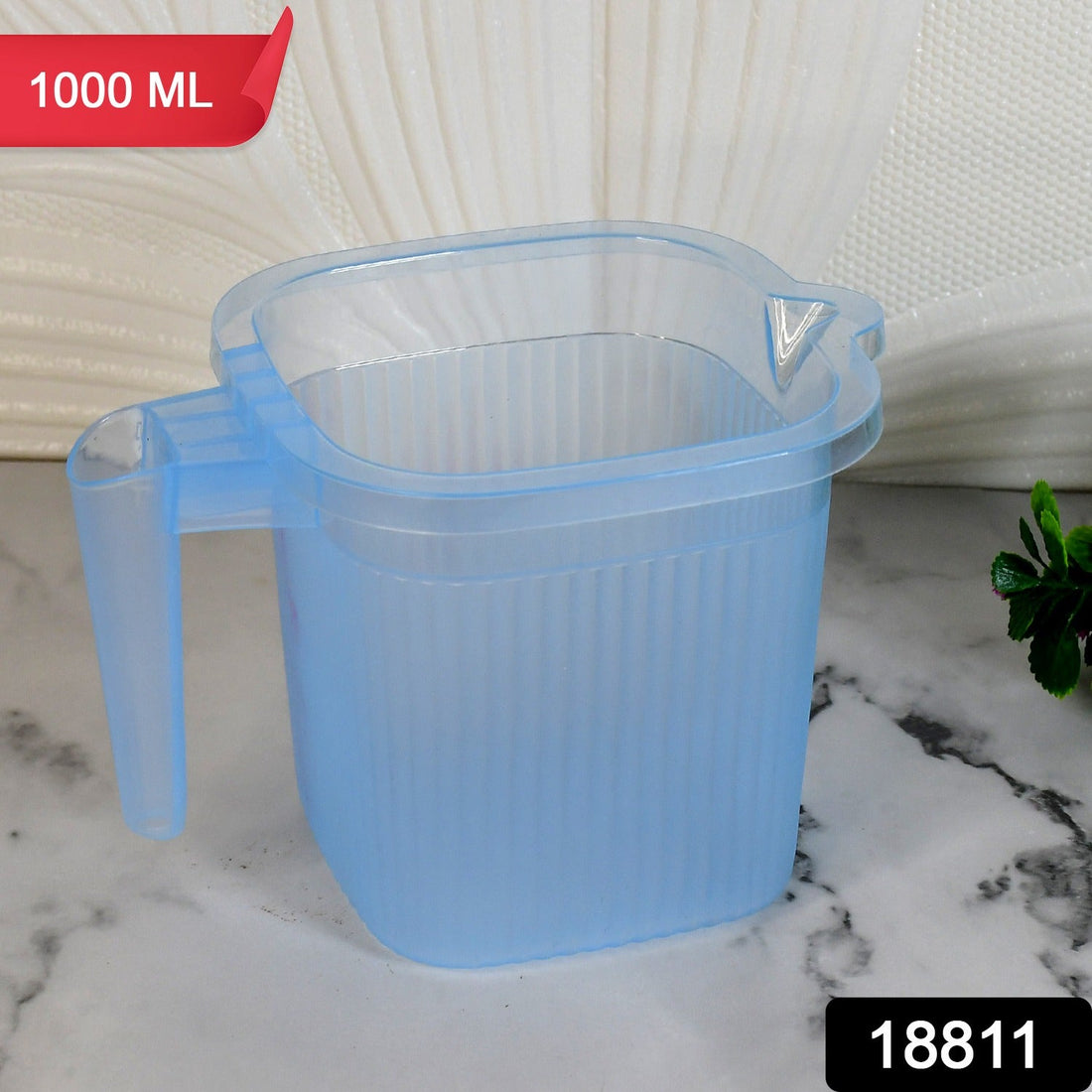 Transparent Bath Mug with ergonomic handle for easy grip.