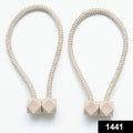 Close-up of a decorative magnetic curtain tieback, showcasing its strong hexagonal magnet.