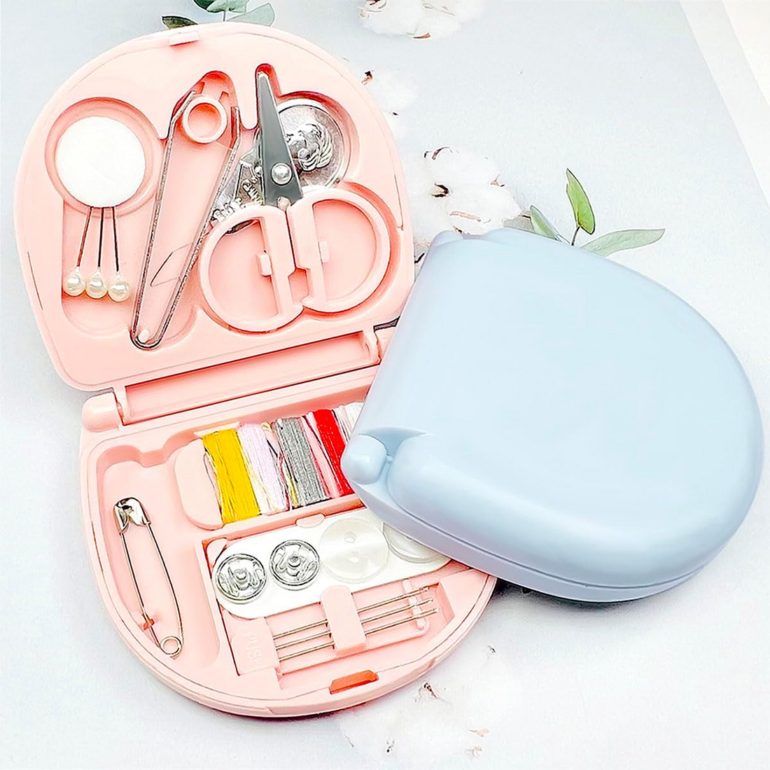 Mini Travel Sewing Kit displayed open with all tools spread out.