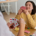 High-definition print on flexible playing cards for clear visibility.