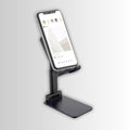 Adjustable mobile holder showcasing its various viewing positions.