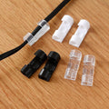 Various cable management clips showcasing their compact and functional design.