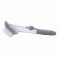 Dish scrub brush on white background showing design